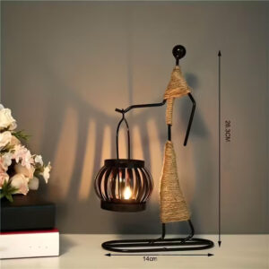 Świecznik metalowy - postać kobieca